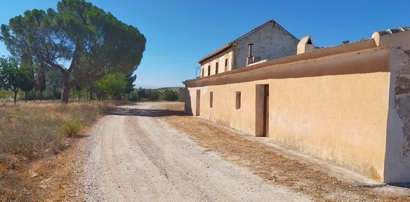 Rural property in Benamaurel, Granada, featuring traditional architecture and scenic surroundings.