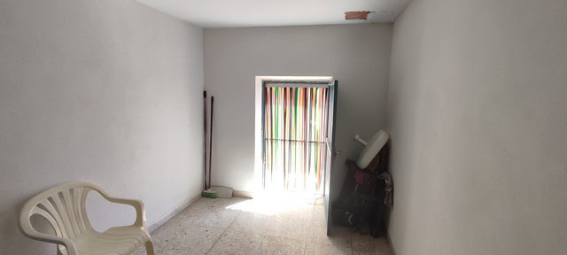 Interior view of a simple village property in Somontin, Almeria, with basic furnishings and natural.
