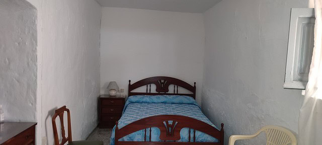 Interior view of a village property in Somontin, Almeria with simple furnishings.