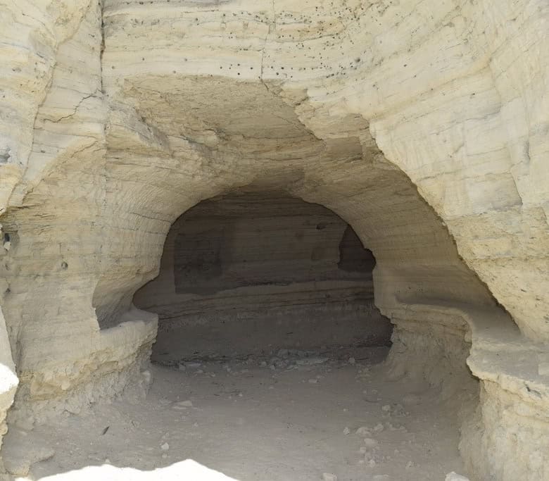 Cave house in Baza, Granada, carved into natural rock with a spacious interior and unique architectu.