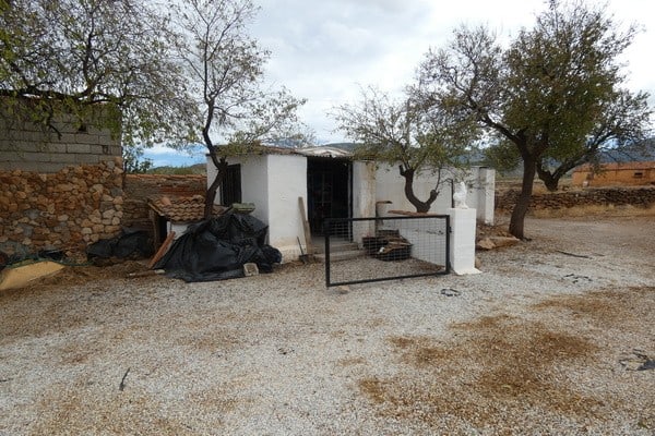 Charming village property in Gor, Granada, featuring rustic architecture and outdoor space. Ideal fo.