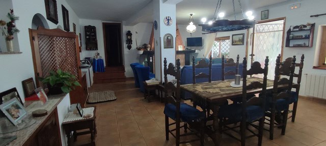 Charming cave house interior in Caniles, Granada, featuring traditional decor and spacious living ar.