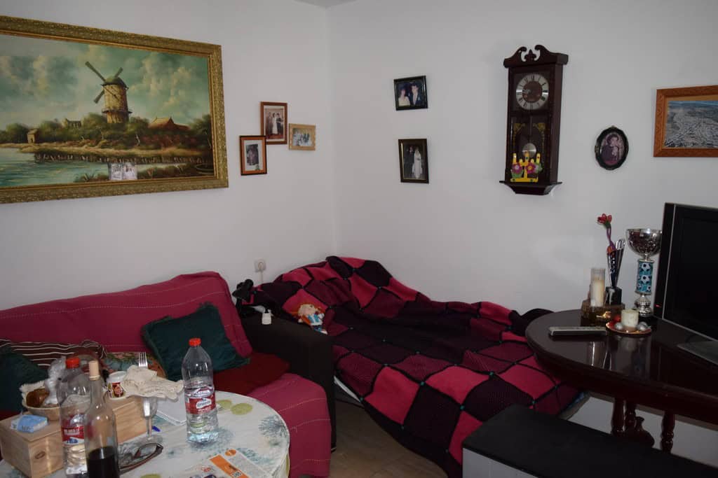 Charming cave house interior in Cuevas del Campo, Granada, featuring cozy living space with traditio.