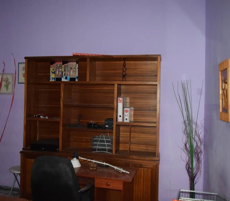 Apartment in Baza, Granada with a cozy workspace and contemporary interior design.