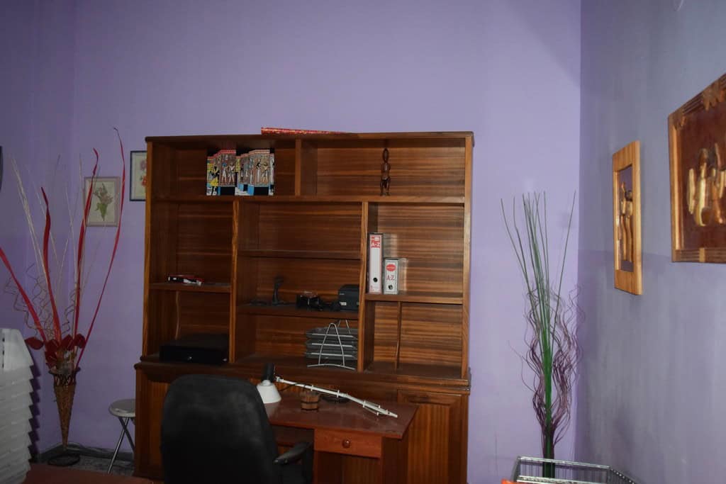 Apartment in Baza, Granada with a cozy workspace and contemporary interior design.