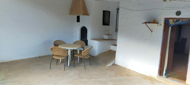 Traditional rural house interior in Seron, Almeria, with whitewashed walls and rustic charm.