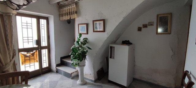 Charming interior of a town house in Tijola, Almeria, featuring a cozy living space with natural lig.