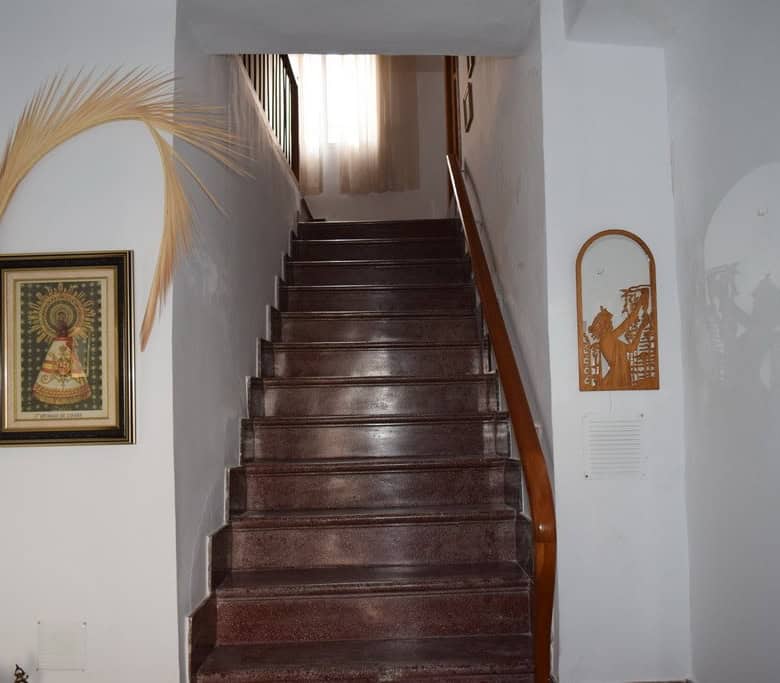 Interior staircase leading to upper floor in Caniles village property, Granada, Spain.