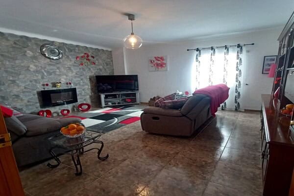 Cozy living room in a village property in Hinojares, Jaen, featuring modern furniture and natural li.