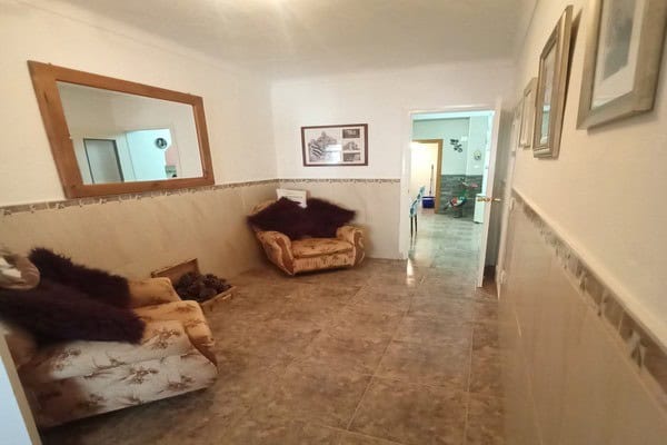 Charming village property with cozy living room in Hinojares, Jaen, ideal for peaceful rural living.