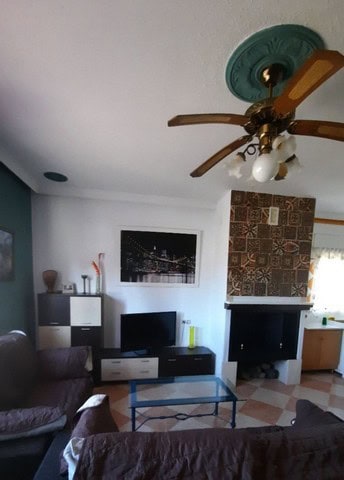 Cozy living room in a villa located in Fines, Almeria, featuring a fireplace, modern furniture, and.