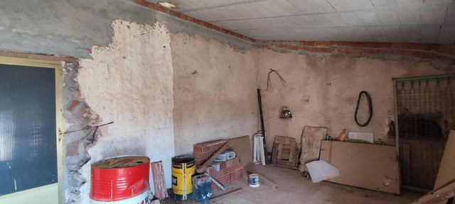 Interior of a rustic rural property in Jamula, Granada, showing unfinished walls and construction ma.