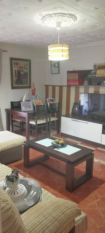 Charming village home interior in Benamaurel, Granada with modern furnishings and cozy ambiance.