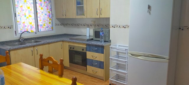 Bright kitchen with modern appliances in Benamaurel, Granada. Perfect for comfortable village living.