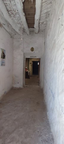 Charming rustic interior of a rural property in Seron, Almeria, with whitewashed walls and exposed w.