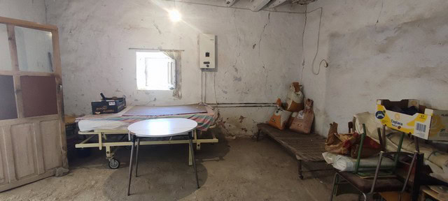 Rural property interior in Seron, Almeria, with basic furnishings and simple setup.