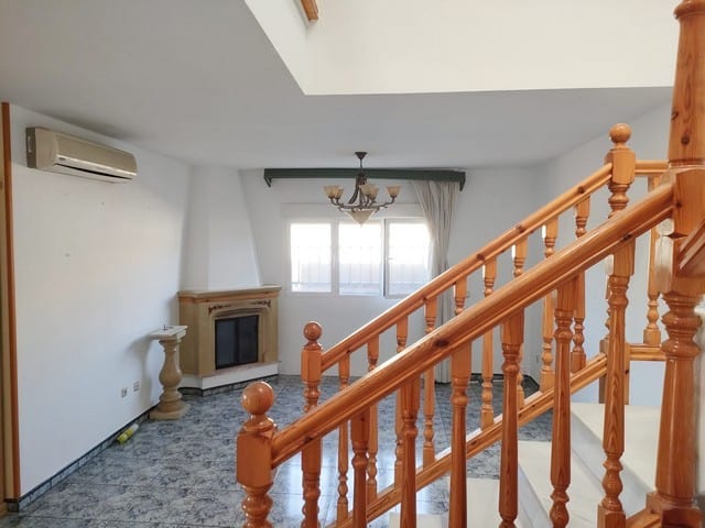 Town House Interior with Fireplace and Wooden Staircase in Fines, Almeria.