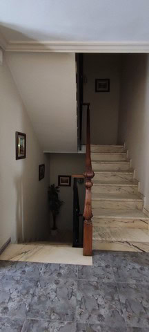 Charming town house in Tijola, Almeria, featuring a staircase and cozy interior. Perfect for those s.
