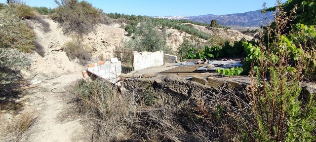 Rural property site in Urracal, Almeria with scenic mountain views and natural landscape.