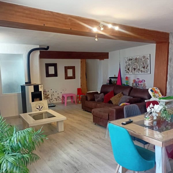 Charming living room in a village property in Fontanar, Jaen, featuring cozy furniture and decorativ.