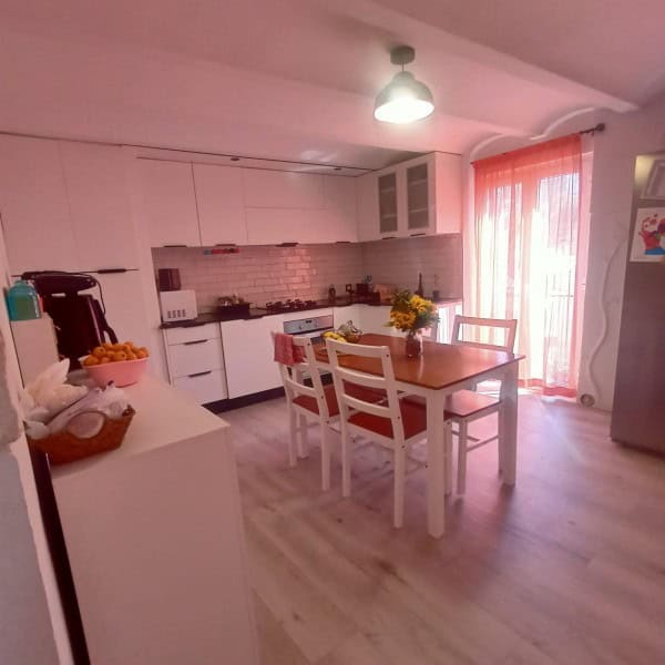 Cozy kitchen in a village home in Fontanar, Jaen, featuring modern appliances and bright natural lig.