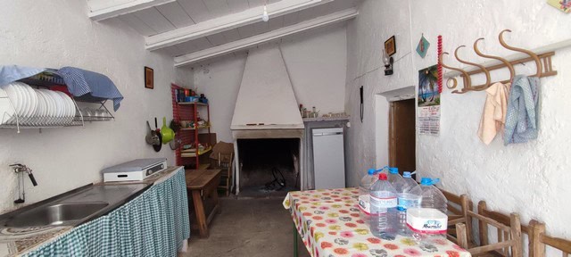 Traditional rural kitchen in Oria, Almeria with basic amenities and rustic charm.
