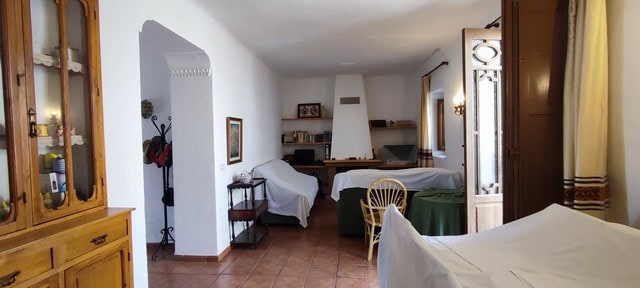 Charming rural home interior in Oria, Almeria, featuring traditional decor and spacious living areas.