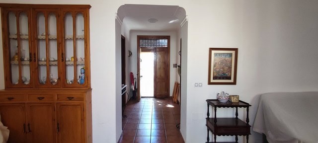 Bright interior of a rural property in Oria, Almeria, showcasing traditional furnishings and cozy li.