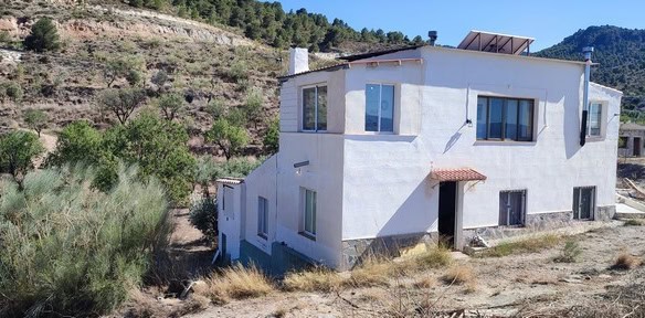 Rural property for sale in Tijola, Almeria, with scenic mountain views and spacious land. Ideal for.