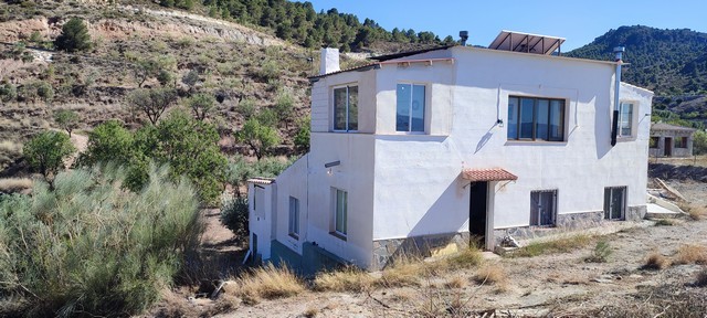 Rural property for sale in Tijola, Almeria, with scenic mountain views and spacious land. Ideal for.