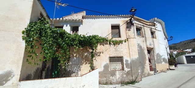 Charming village house in Bayarque, Almeria, with rustic features and outdoor space. Perfect for ren.