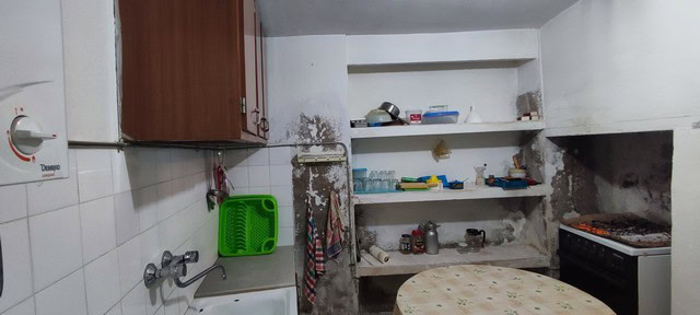 Interior view of a rustic kitchen in a village property in Bayarque, Almeria.