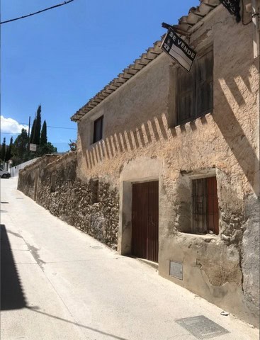 Charming village house for sale in Bayarque, Almeria, with rustic features and scenic surroundings.