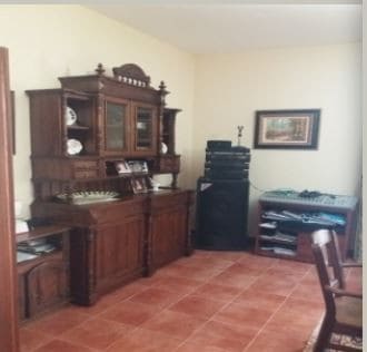 Traditional wooden dining room cabinet in a property in Oria, Almeria.