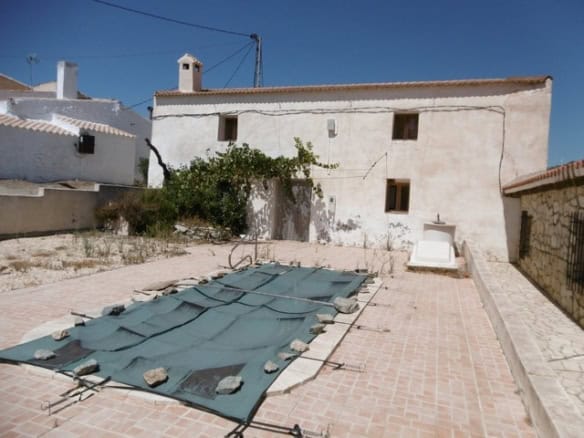 Rural property with outdoor space in Hijate, Almeria, featuring traditional architecture and a spaci.