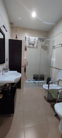Bathroom of a town house in Tijola, Almeria, featuring a shower, sink, and modern fixtures.
