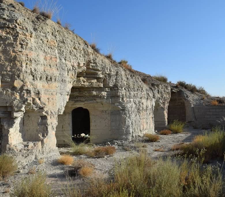 Ancient cave house in Benamaurel, Granada, with natural rock formations and historical architecture.