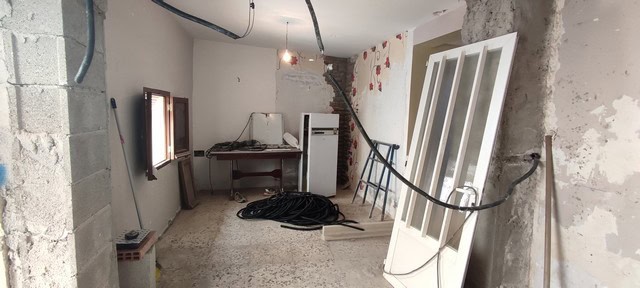 Interior view of a town house in Tijola, Almeria, showing ongoing construction work and interior upd.