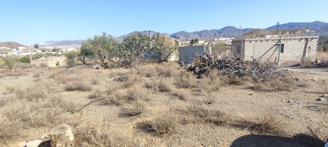 Rural property land in Olula del Rio, Almeria with dry terrain and sparse vegetation.