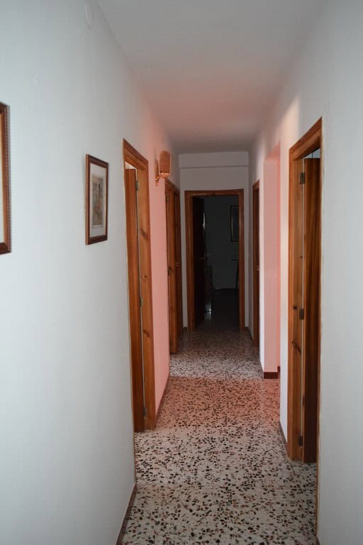 Interior view of a traditional cave house hallway in Castillejar, Granada, Spain.