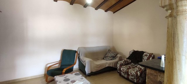 Cozy interior of a rural property in Sierro, Almeria, featuring simple furnishings and rustic charm.
