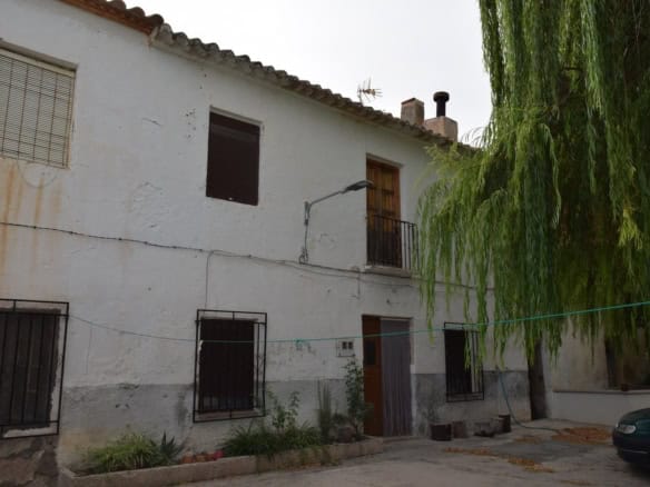 Charming village house in Cortes de Baza, Granada, with traditional architecture and lush surroundin.