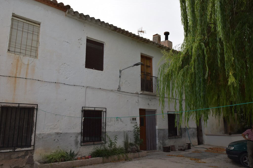Charming village house in Cortes de Baza, Granada, with traditional architecture and lush surroundin.