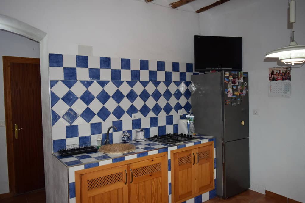 Charming kitchen in a village property located in Cortes de Baza, Granada, featuring traditional blu.