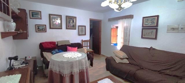 Charming interior of a rural property in Seron, Almeria, featuring cozy living spaces and traditiona.