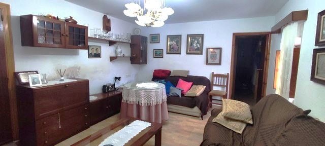 Charming living room with traditional furniture in a rural property in Seron, Almeria. Perfect for r.