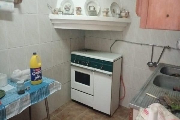 Cozy kitchen in a village property located in Hinojares, Jaen, featuring basic appliances and simple.