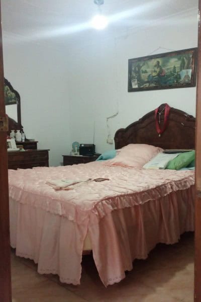 Charming bedroom in a traditional village property located in Hinojares, Jaen, featuring vintage fur.