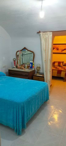 Charming cave house in Benamaurel, Granada, featuring rustic decor and cozy interiors. Perfect for u.