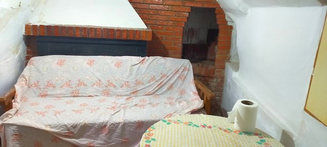 Charming village property with cozy interior and traditional fireplace in Benamaurel, Granada.